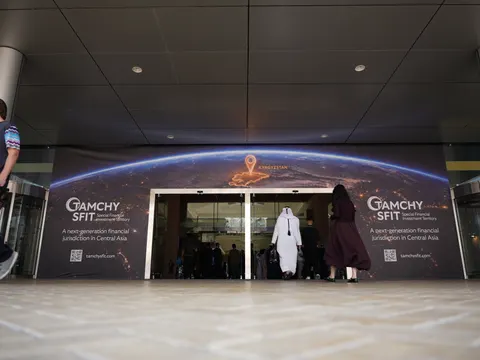 The AIM Congress venue in Dubai: the entrance dressed in Tamchy SFIT branding and the atmosphere of the event